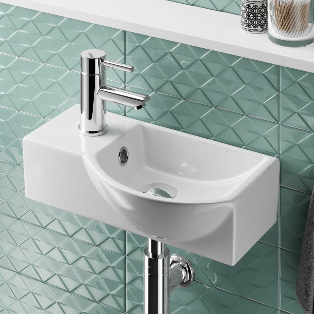 small cloakroom basin and tap