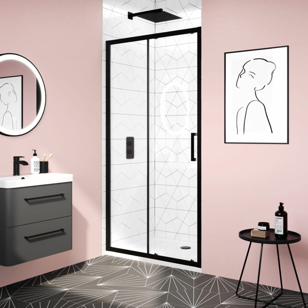 pink bathroom with sliding shower doors