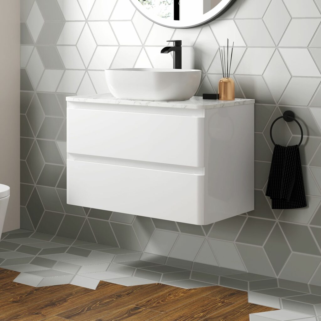 geometric wall with wood effect floor and white wall hung unit