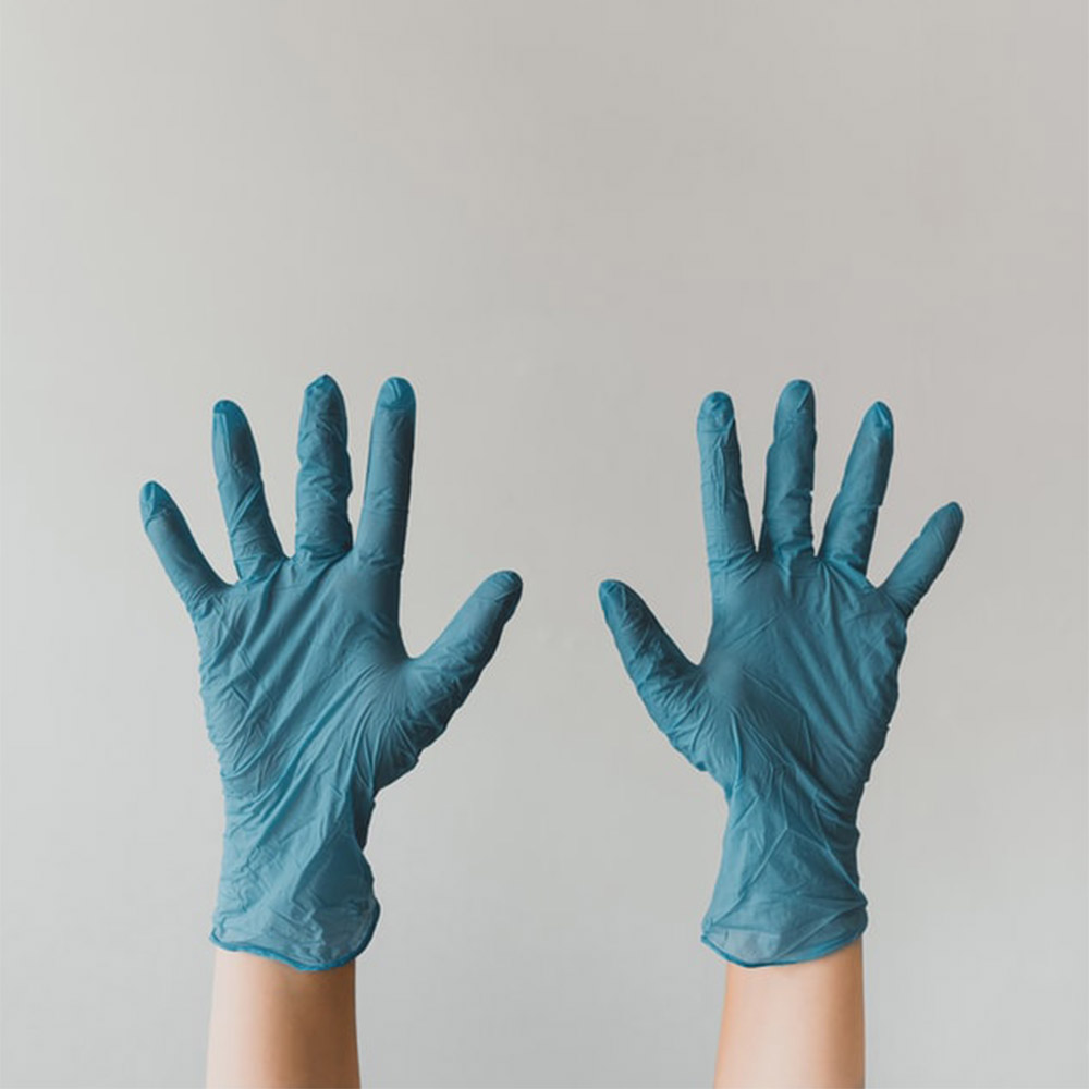 gloved cleaning hands