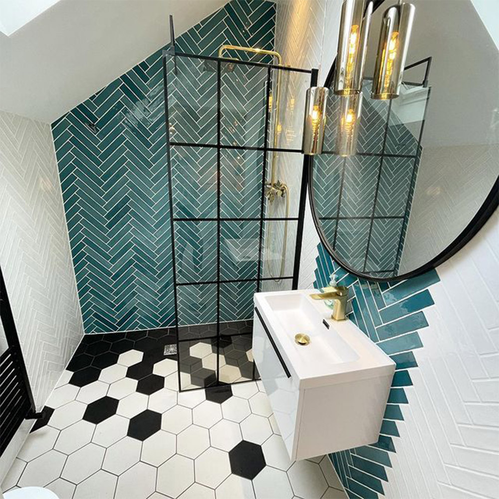 easy clean matt black Crittall style bath screen grid in blue tiled bathroom